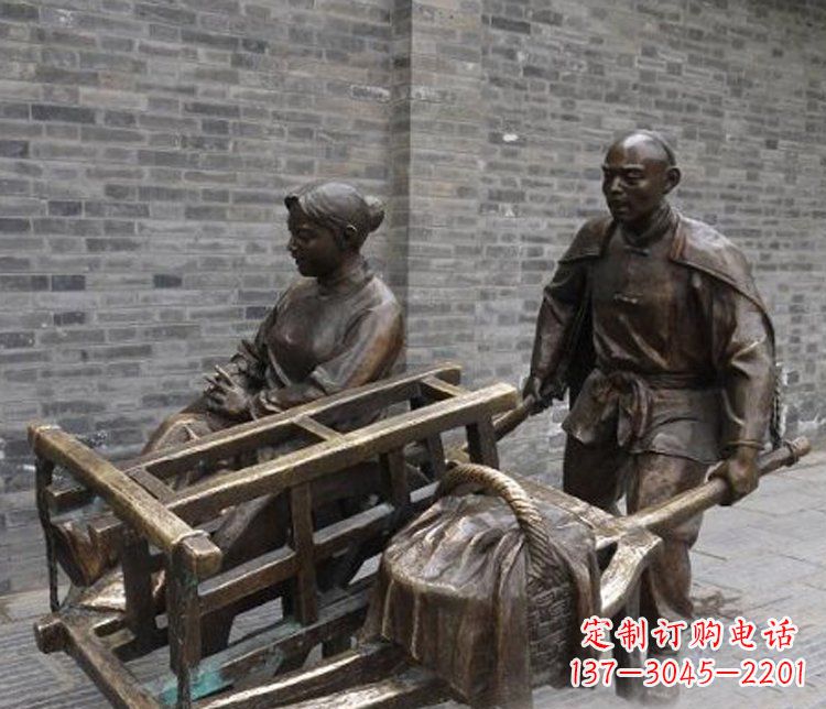 郴州推独轮车的人物铜雕