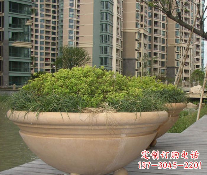郴州小区景观晚霞红花盆石雕